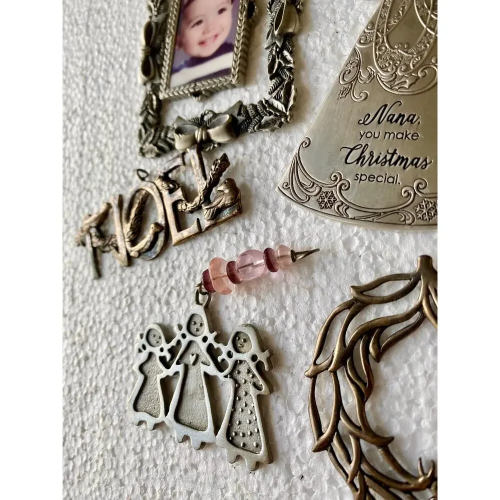 vintage-style metal holiday decorations features silver-toned pewter ornaments